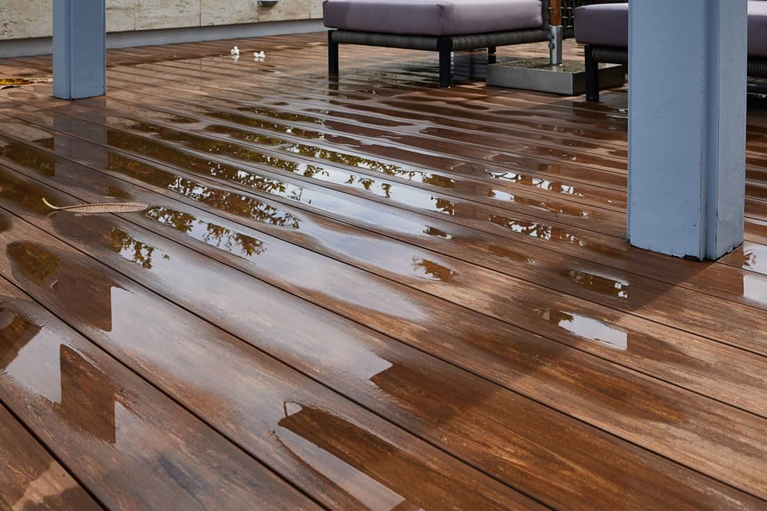 water getting into cracks of wood floor